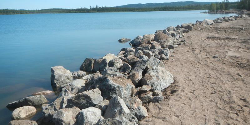 line of boulders along the shore. 
