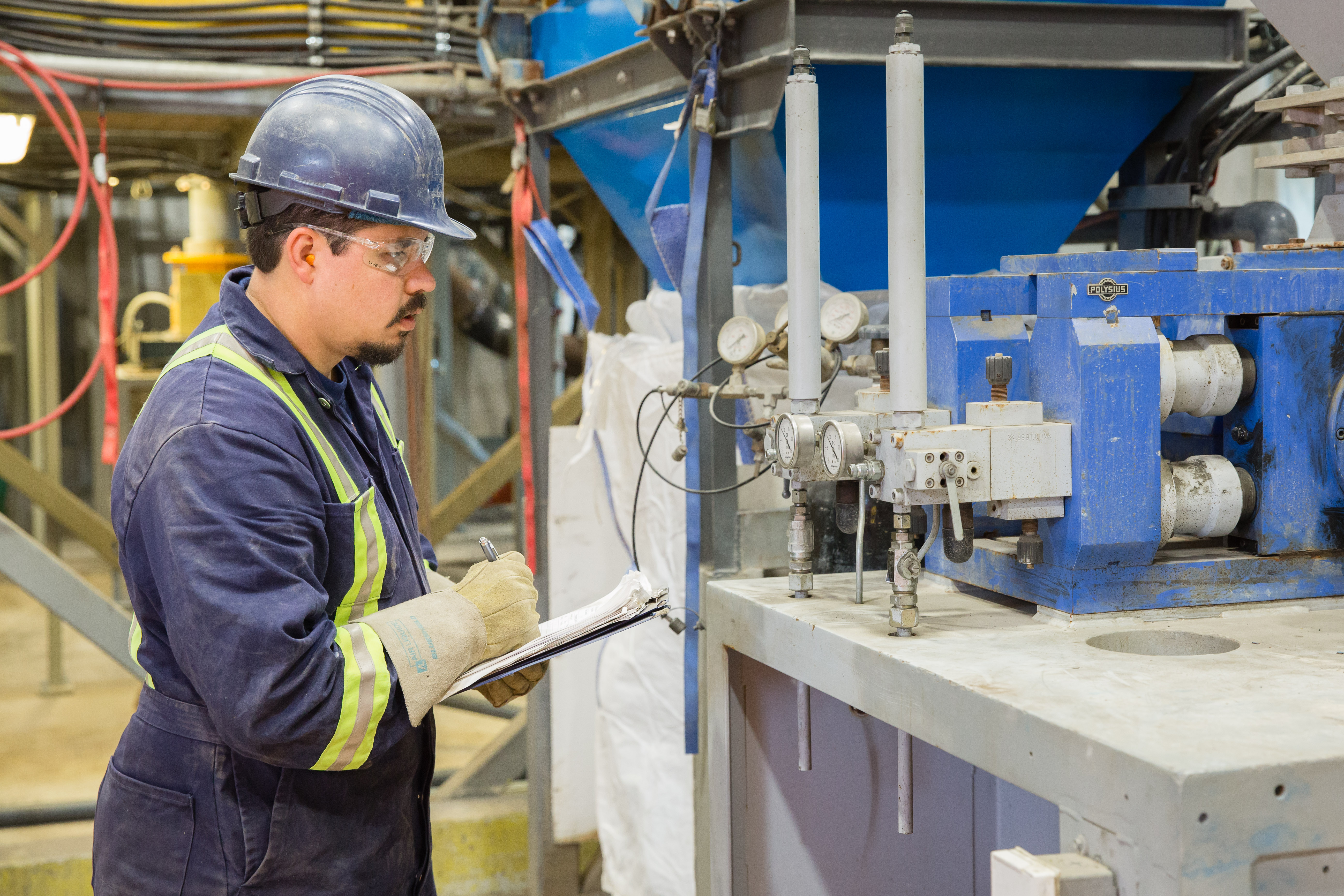 Technician inspects equipment