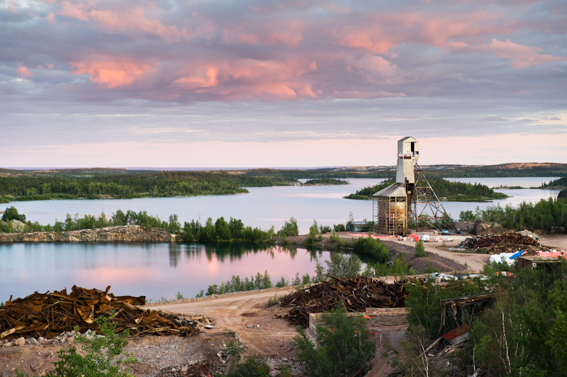 gunnar mine site and headframe against sunset