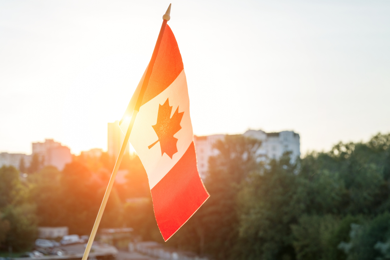 canadian flag sunlight src received immigrant integration award