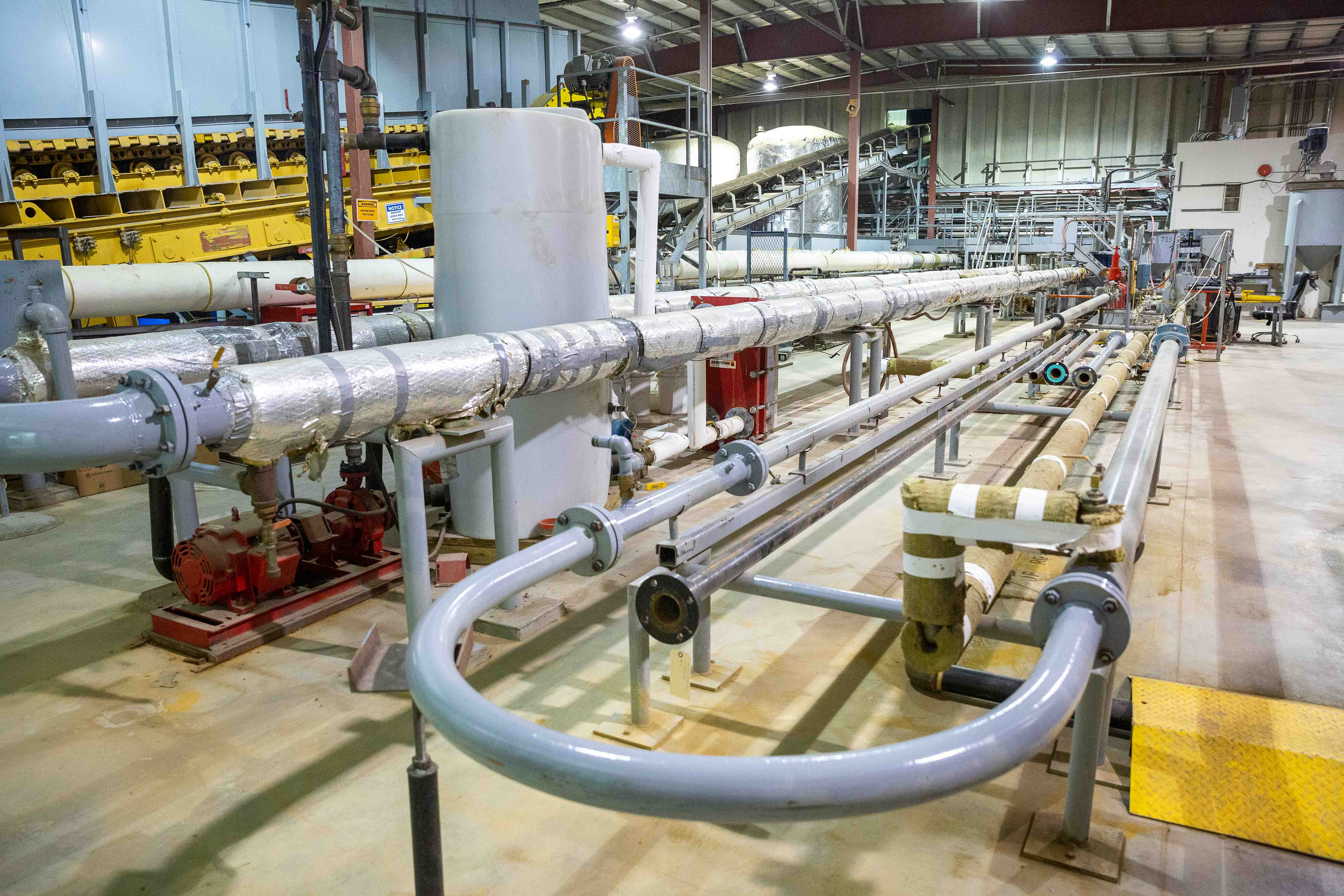 Expansive room filled with looping pipes at SRC's Pipe Flow Technology Centre