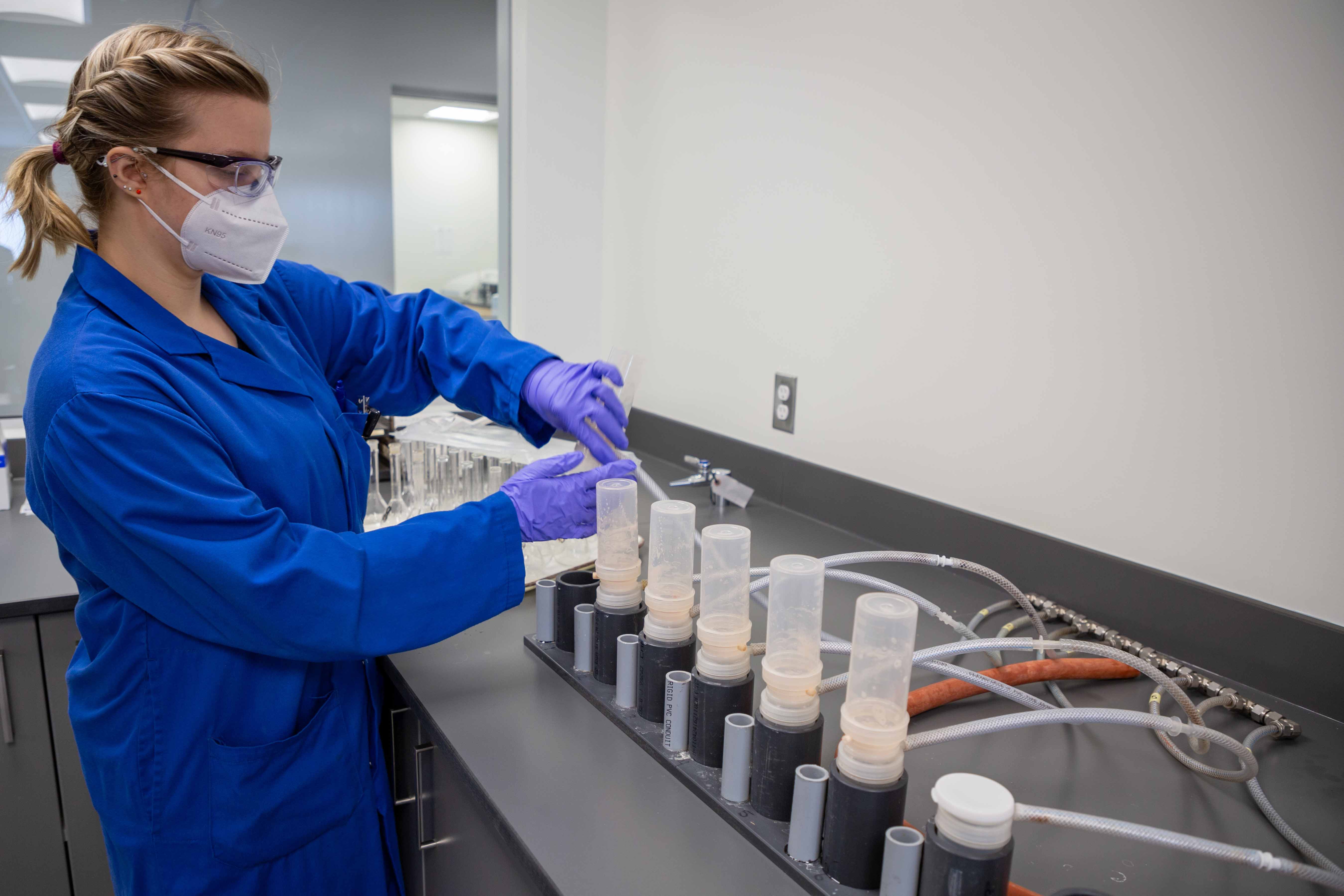 technologist works with potash samples