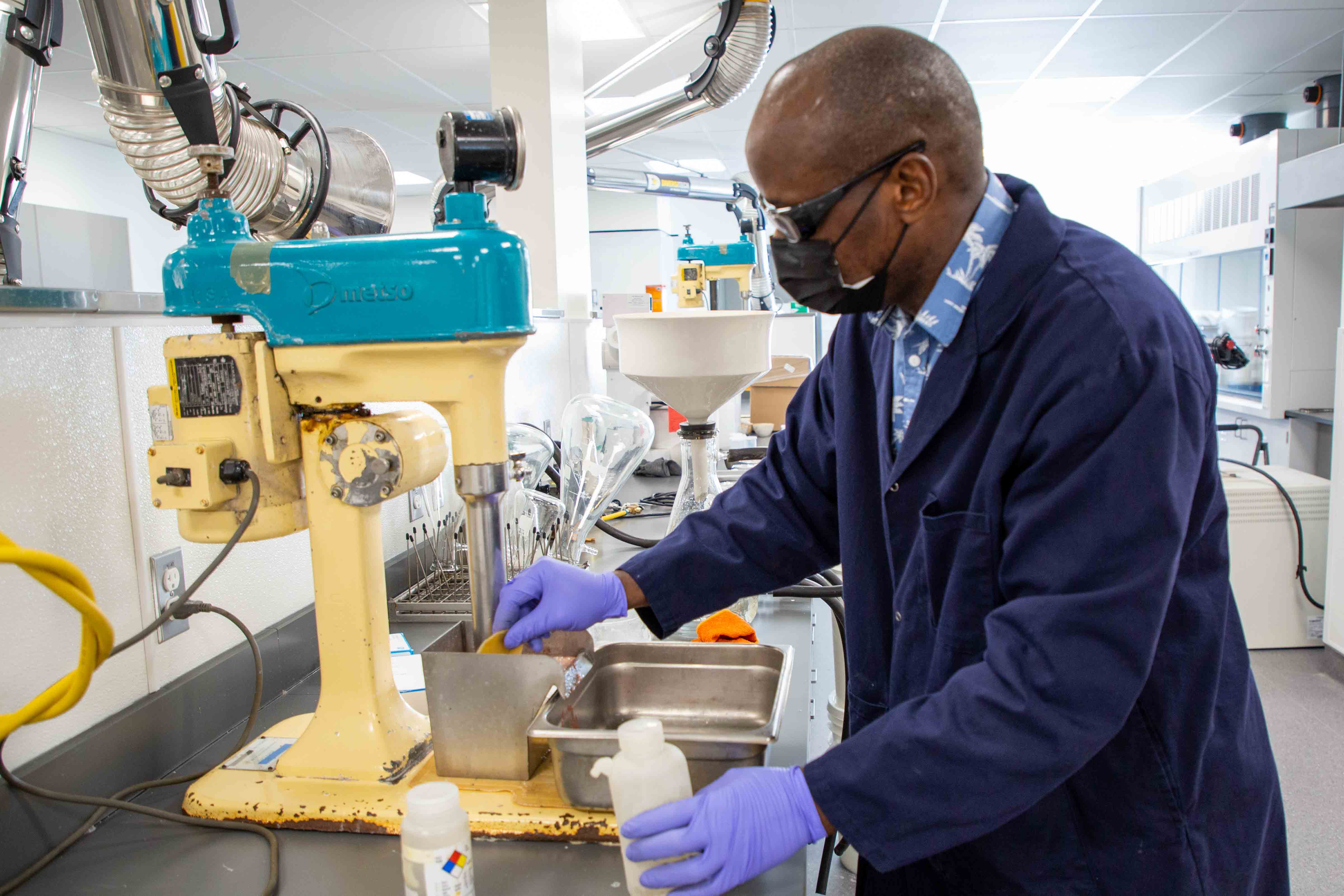 src research scientist works in mineral processing potash lab