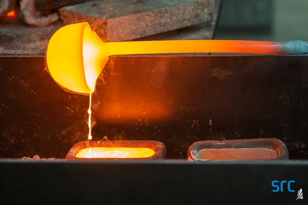 hot ladle pouring liquid to make ingots at src facility