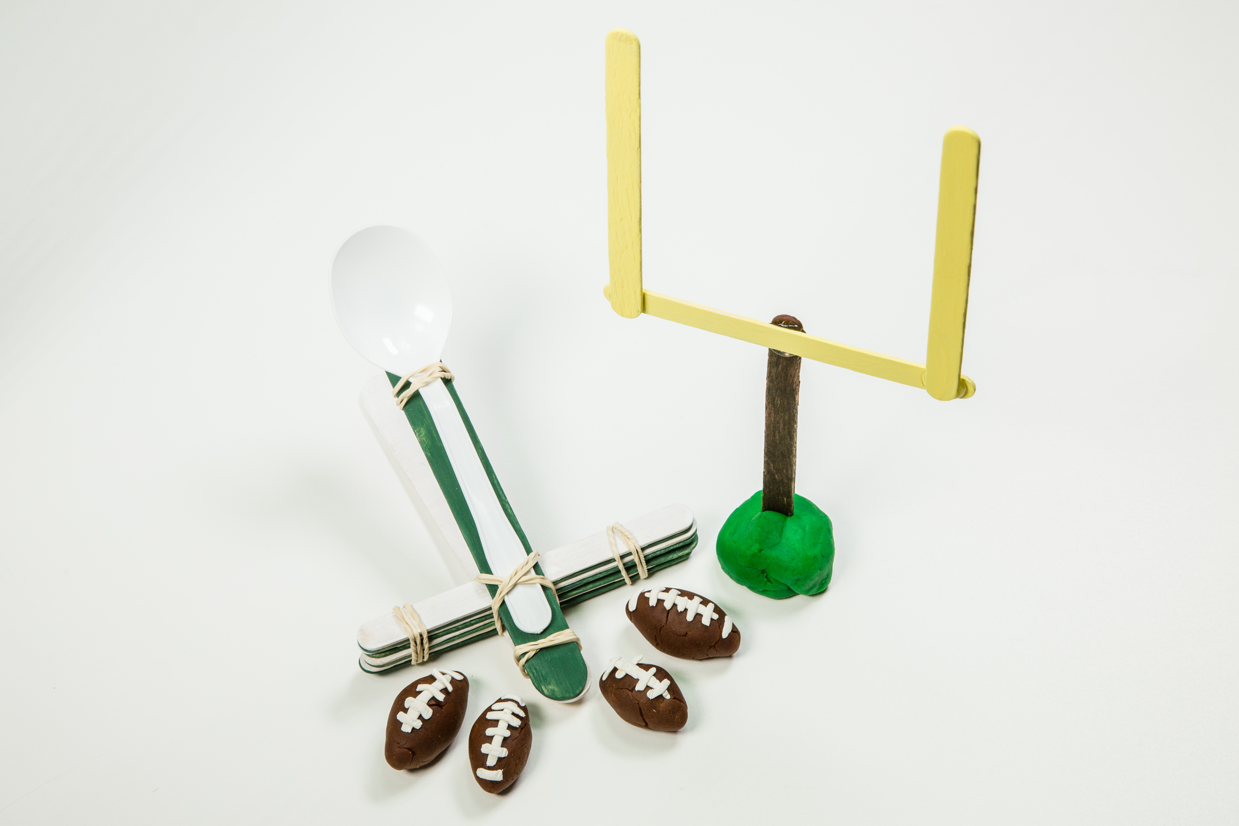 goal post and catapult made out of wooden craft sticks
