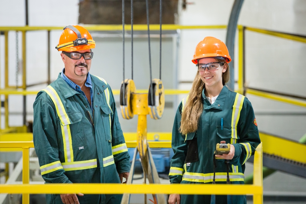 two engineers work at src's industrial engineering lab