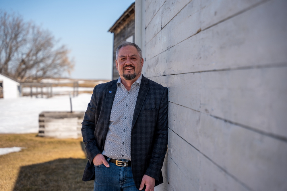 Mark director of indigenous relations at src beside building at batoche
