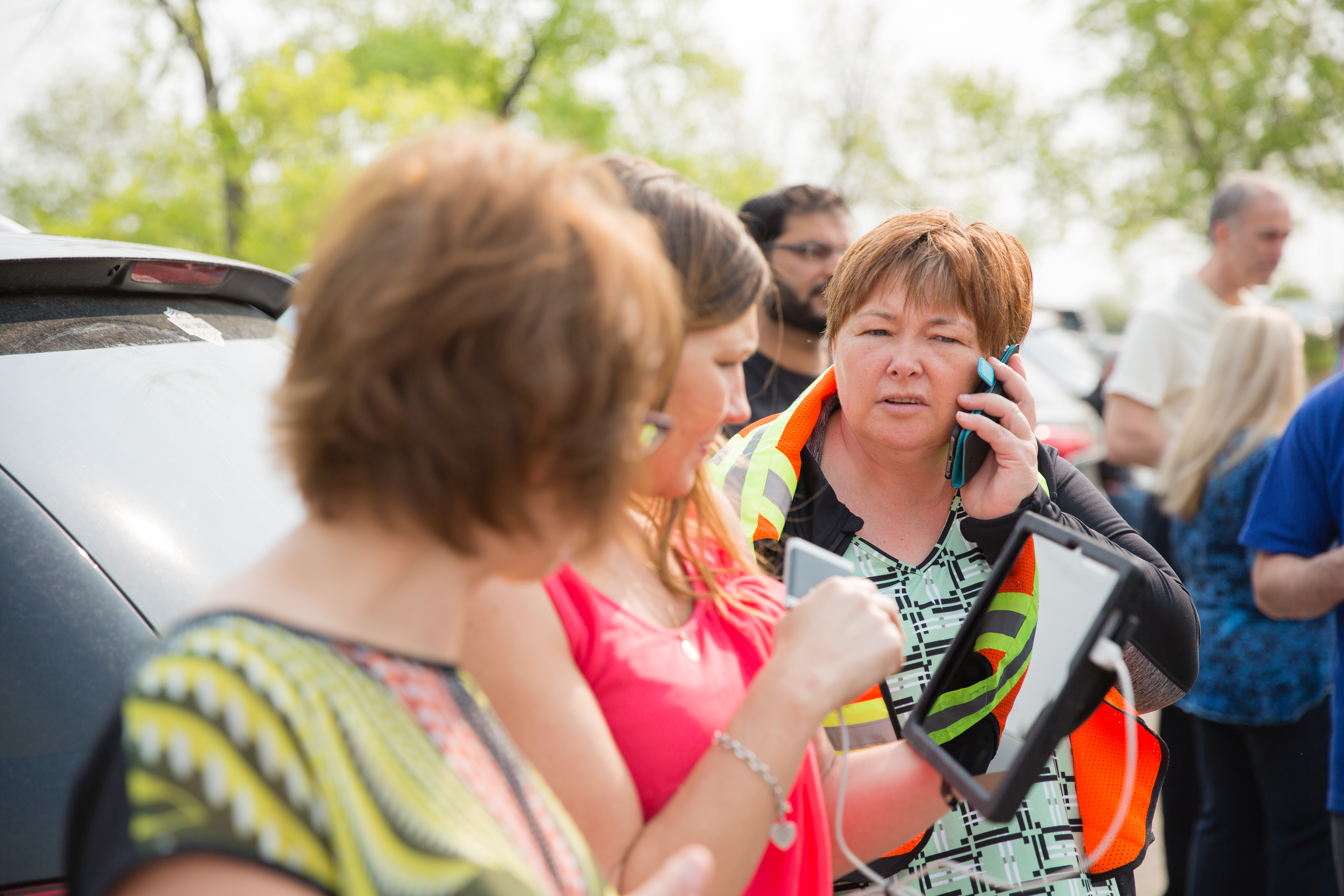 woman on phone during fire drill