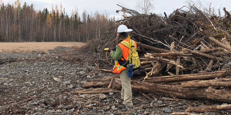 an SRC employee performing a gamma survey