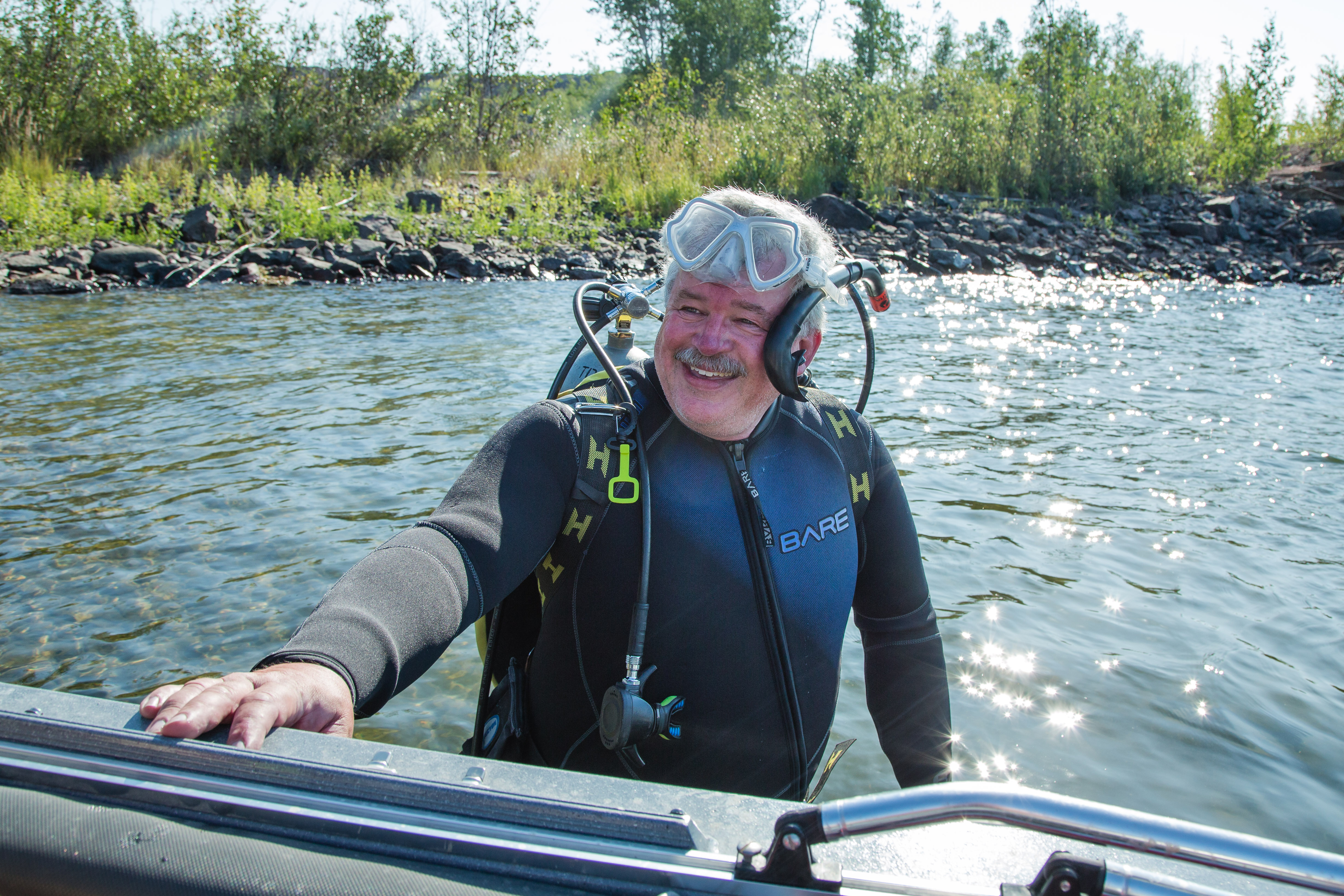 man in scuba suit