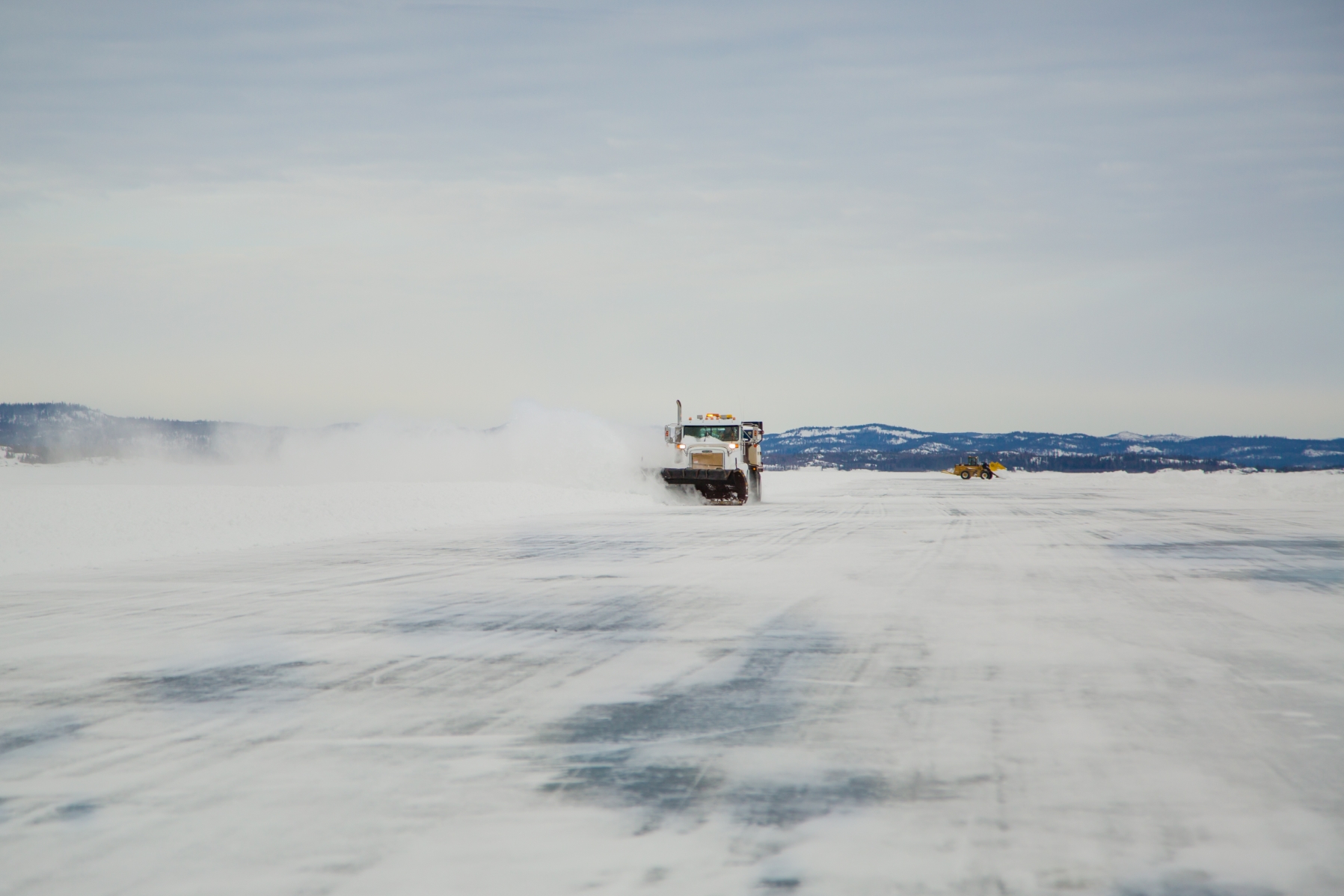 truck clearing src ice road in saskatchewan