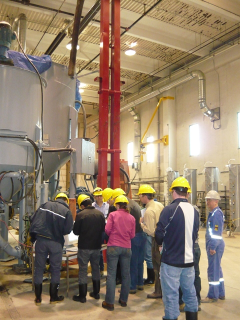 students gather around a tank