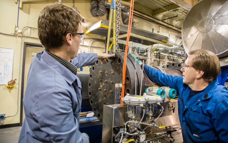 two research engineers work on model at src eor lab