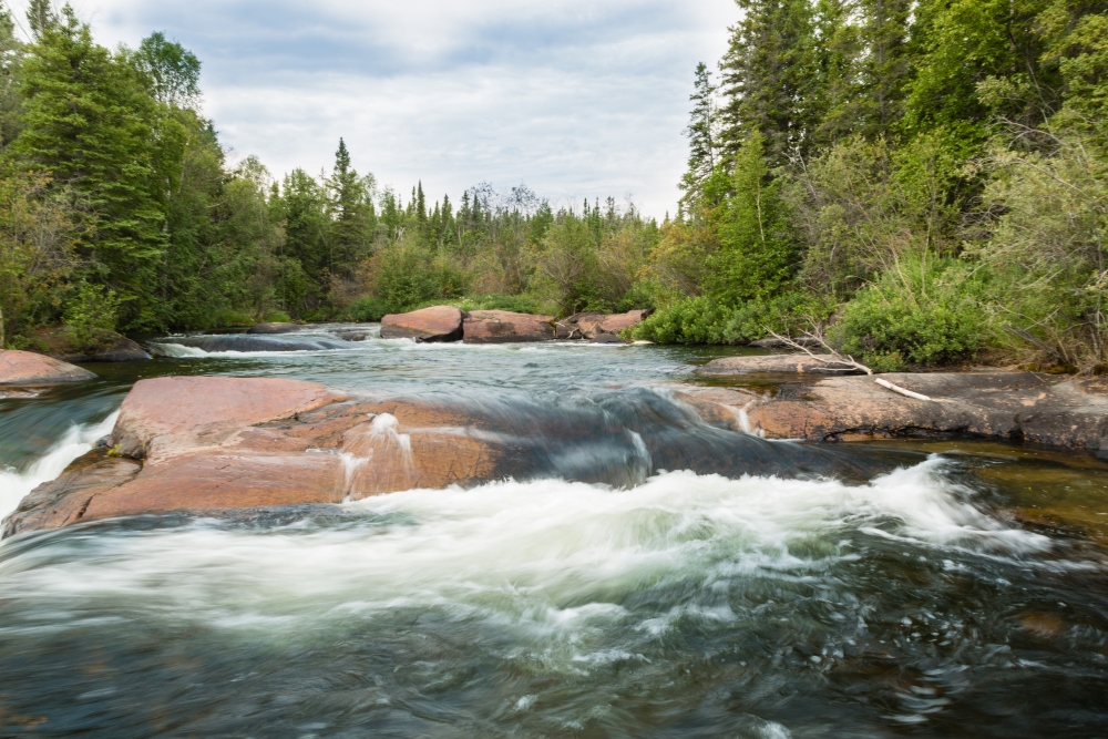 src samples water from northern saskatchewan lake