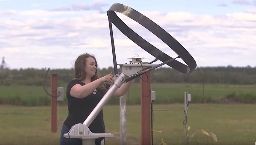 src employee works at climate reference station