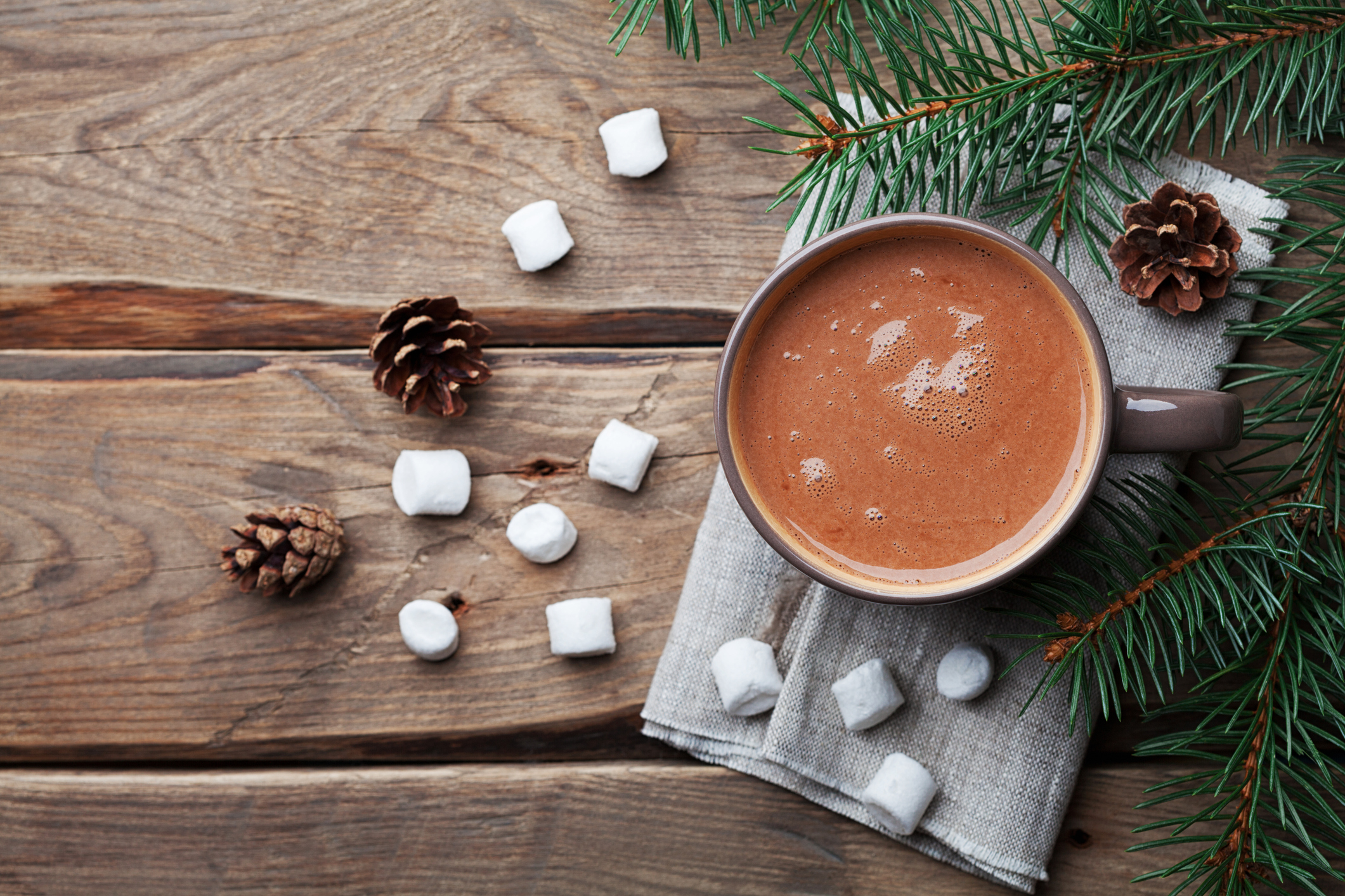 mug of hot chocolate with marshmallows on table