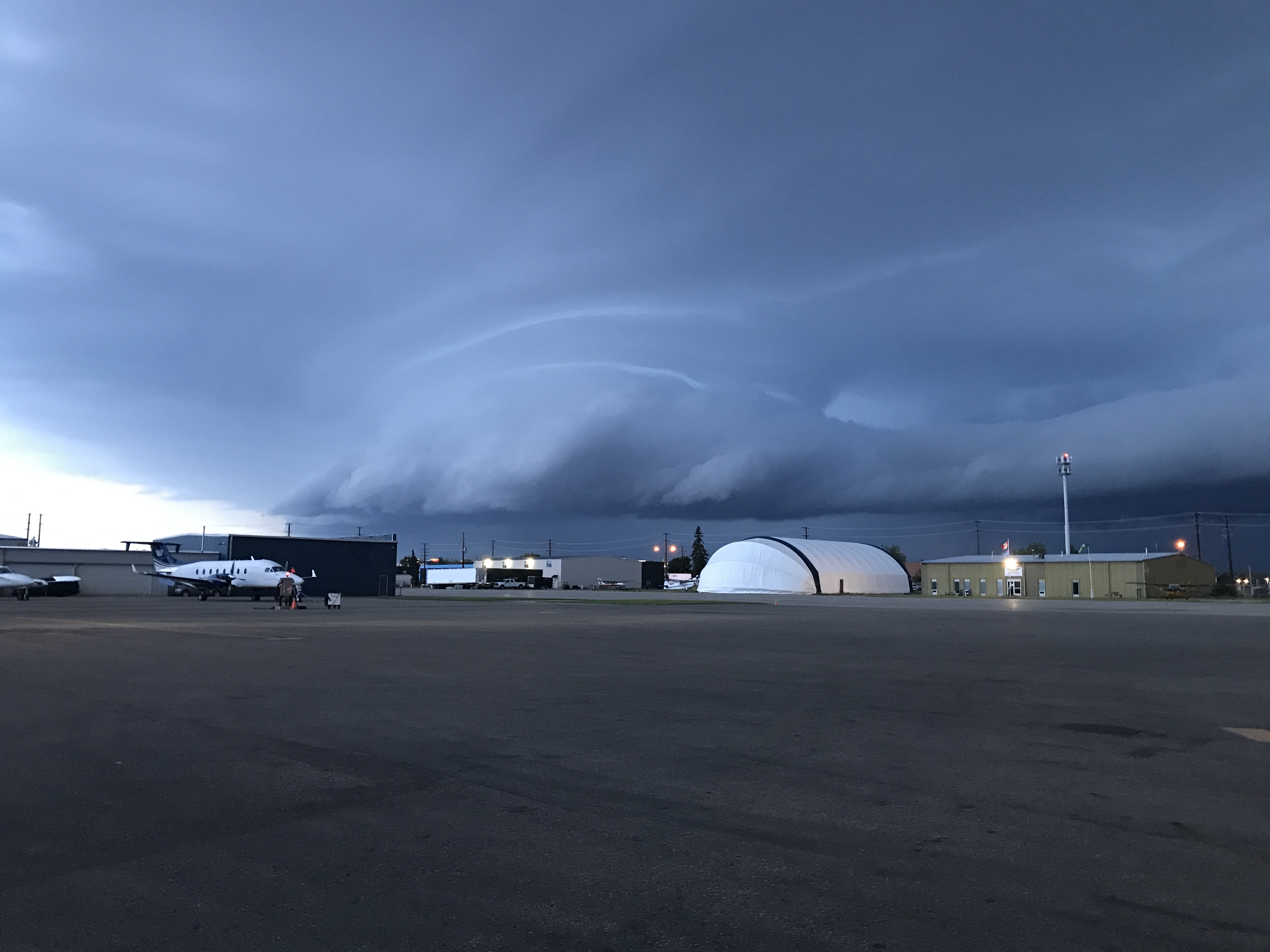 storm clouds moving across airport