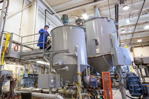 female technician working at src pipe flow