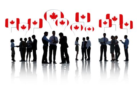 Group Of Business People Talking And Discussing Canada