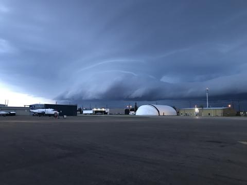 storm clouds moving across airport
