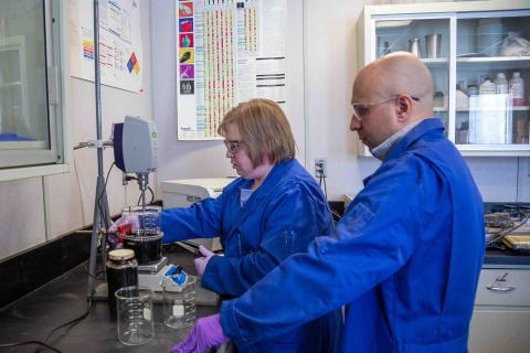 two research engineers work on development of an active clay analyzer