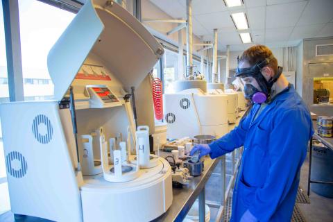 src employee safely analyzes uranium sample