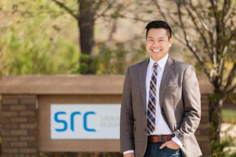 src employee standing outside by src sign