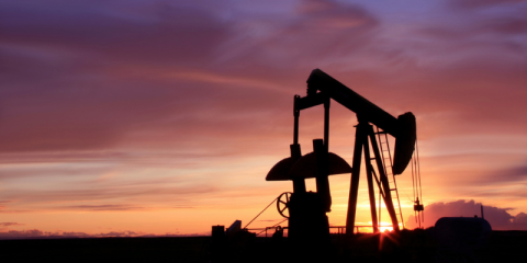 oil well during sunset