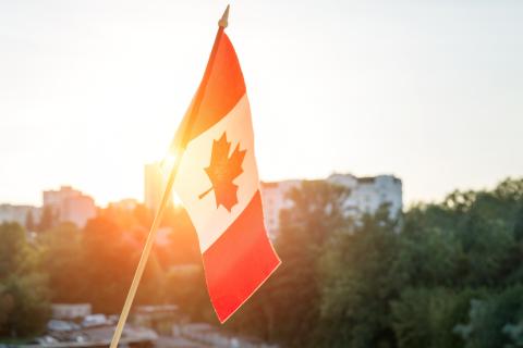 canadian flag sunlight src received immigrant integration award
