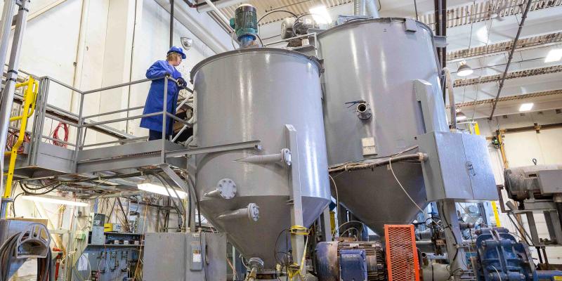 female technician working at src pipe flow