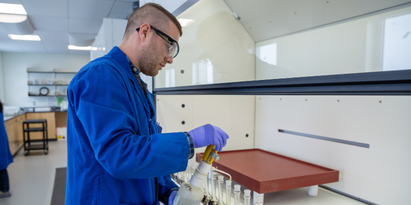 src lab employee performing test