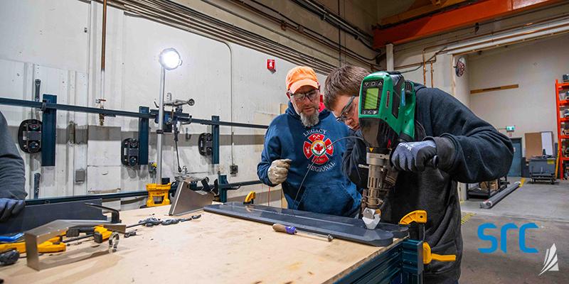 instructor and student at src's fabrication facility