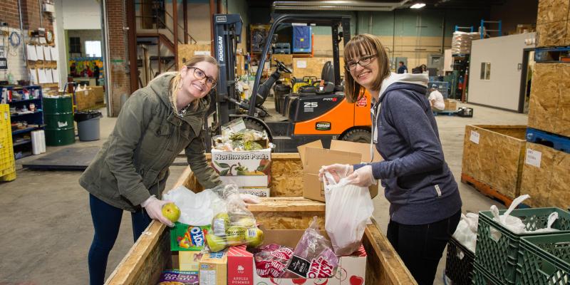 two src volunteers at food bank