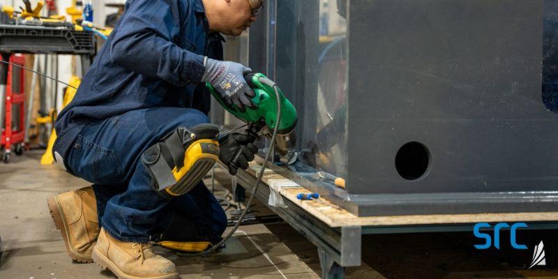 research technologist works on src solvent extraction cells