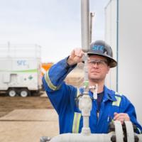 SRC researcher at well site monitoring emissions