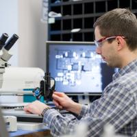 engineer moves custom lab equipment 