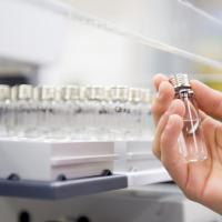 hand holding src sample in a lab