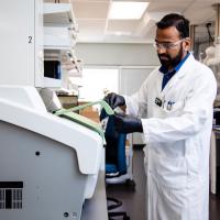 SRC technician tests environmental sample