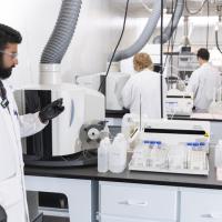 lab tech analyzes sample at src environmental analytical laboratories