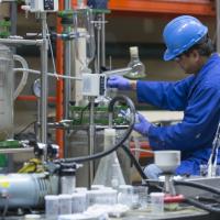 technician working at src uranium mineral processing pilot plant