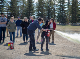 src employees in fire extinguisher training